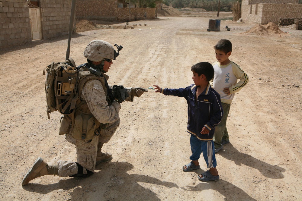 Marines make kids happy during patrol