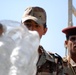 Iraqi army soldiers distribute food, water to Baghdad residents