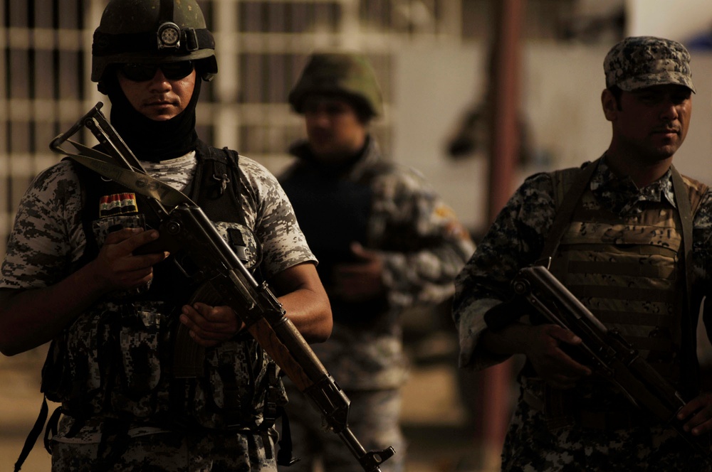 National Police stand guard