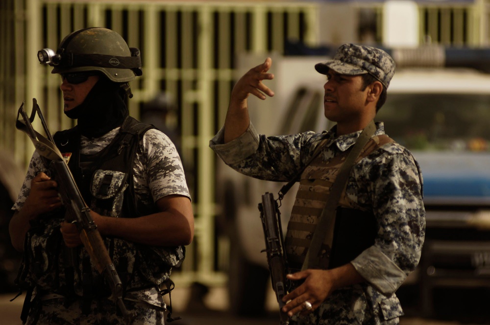 National Police stand guard