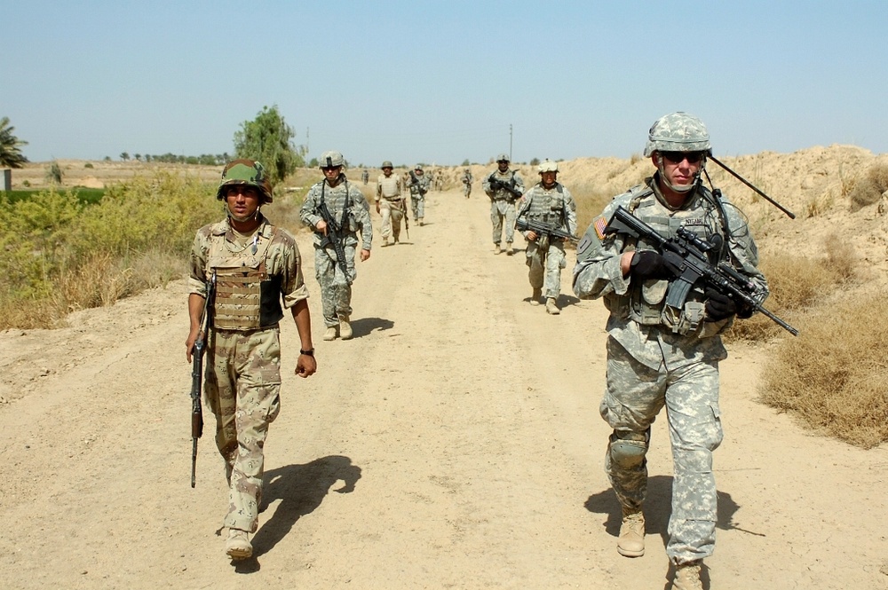 2nd BCT Soldiers clear road of IEDs, allow residents to return home