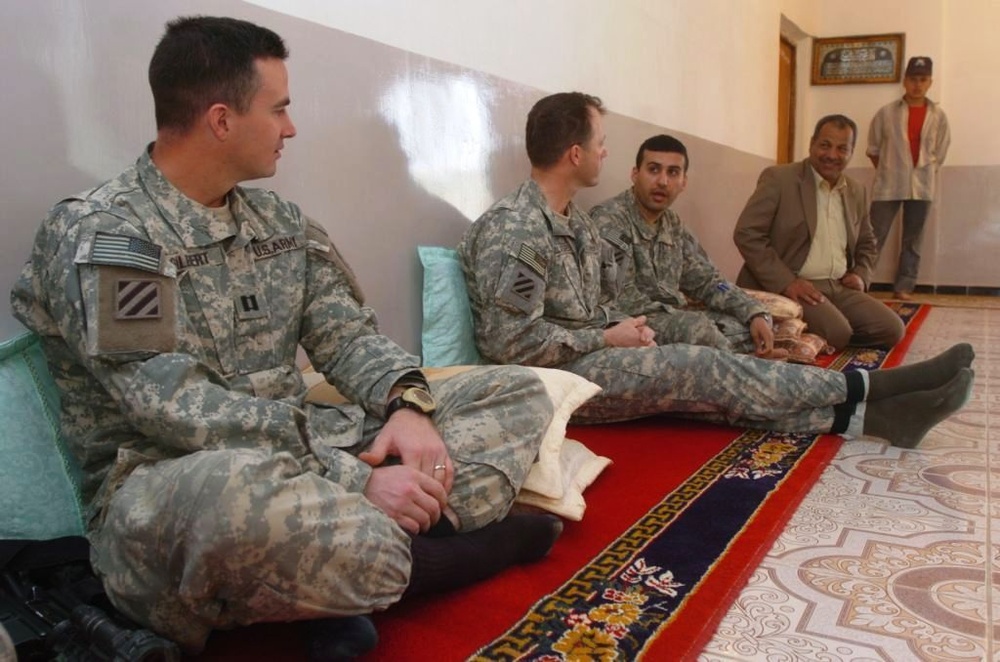 Soldiers, Iraqi Community Leaders Discuss Rebuilding Effort