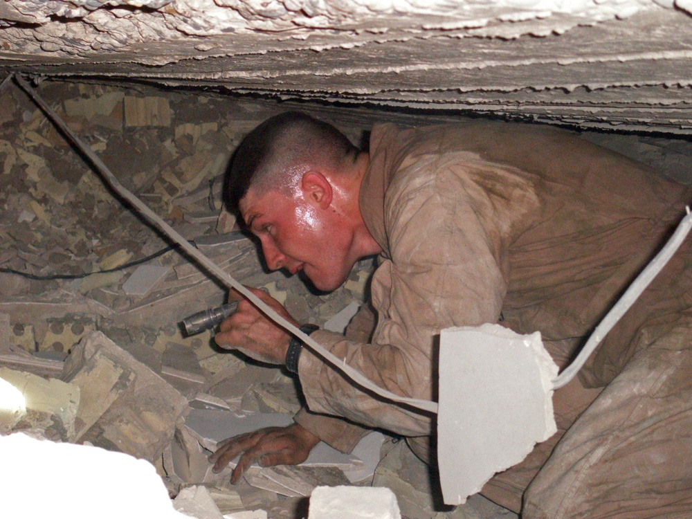 Iraqis find explosives cache; tip off Marines