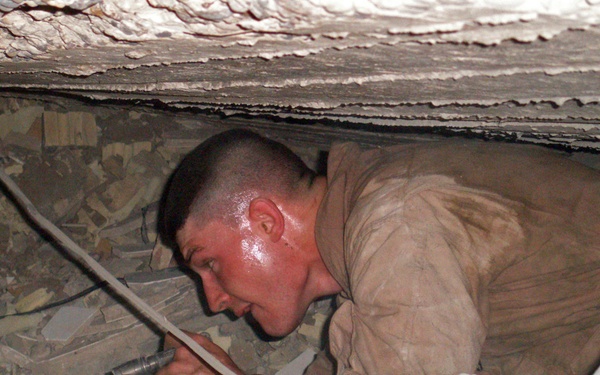 Iraqis find explosives cache; tip off Marines