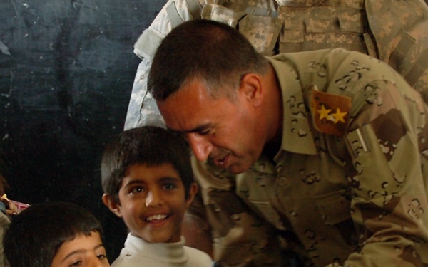IP and CF Soldiers Surprise Mosul Elementary With Gifts