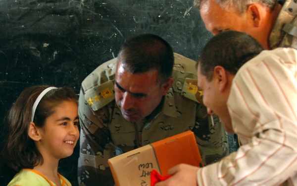 IP and CF Soldiers Surprise Mosul Elementary With Gifts