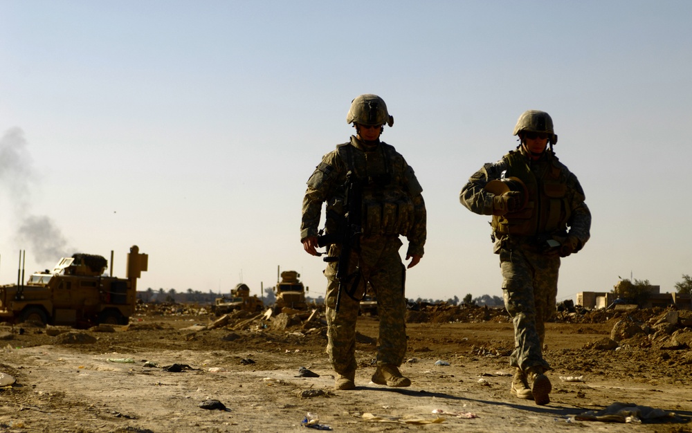 U.S. Army Soldiers patrol near Forward Operating Base
