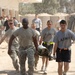 Soldiers perform medical treatment on suicide bomb victims