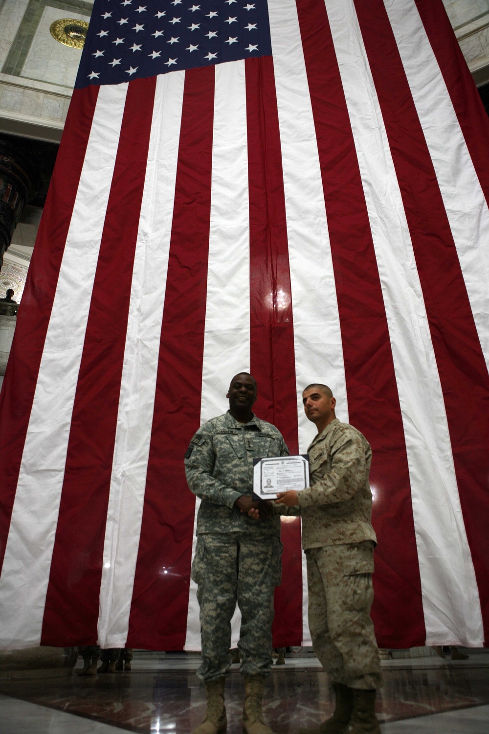 Coming full circle, Iraqi born Marine receives American citizenship in country of his birth