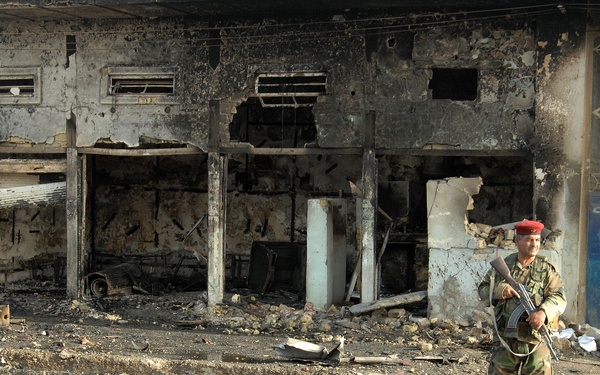 Iraqi Police Patrol Site of VBIED Attack in Baqubah