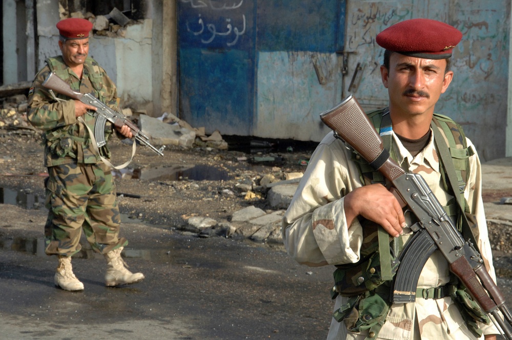 Iraqi Police Patrol Site of VBIED Attack in Baqubah