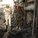 Iraqi Police Patrol Site of VBIED Attack in Baqubah