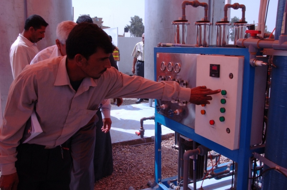 Artesian well pumps clean water for Zambraniya, Bayjia