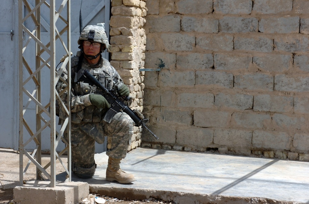 Strike Soldiers, IA patrol Abu Ghraib market, discover needs of local Iraqi citizens