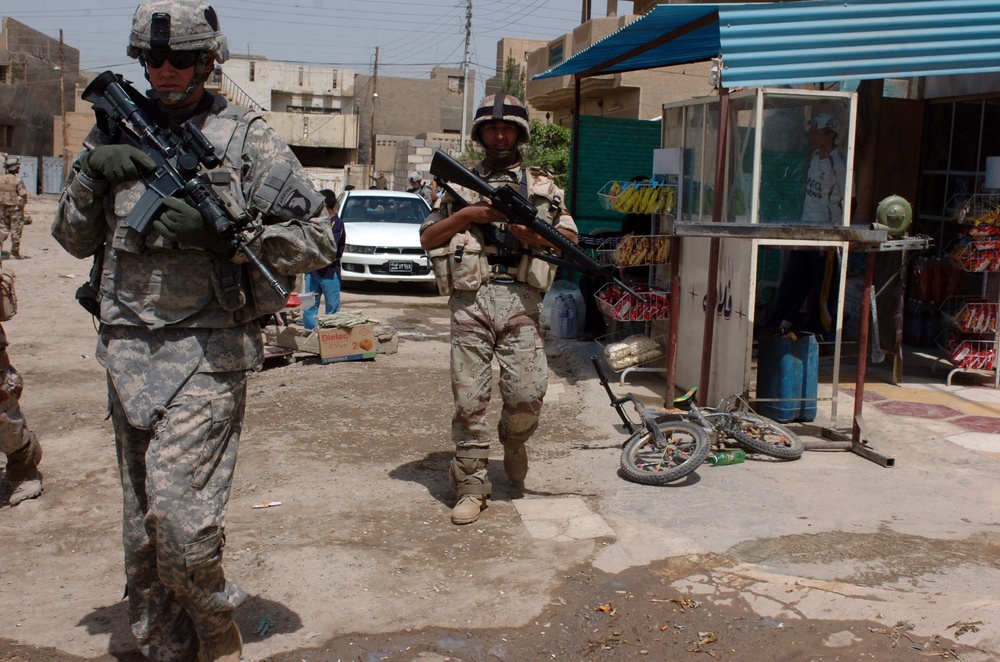 DVIDS Images Strike Soldiers, IA patrol Abu Ghraib market, discover