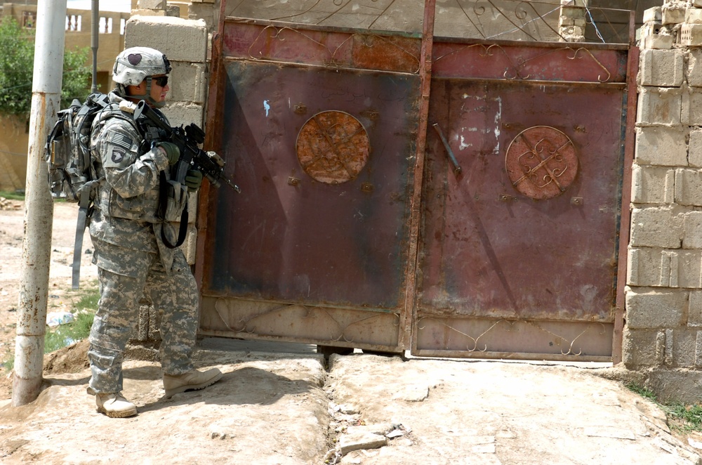 Strike Soldiers, IA patrol Abu Ghraib market, discover needs of local Iraqi citizens