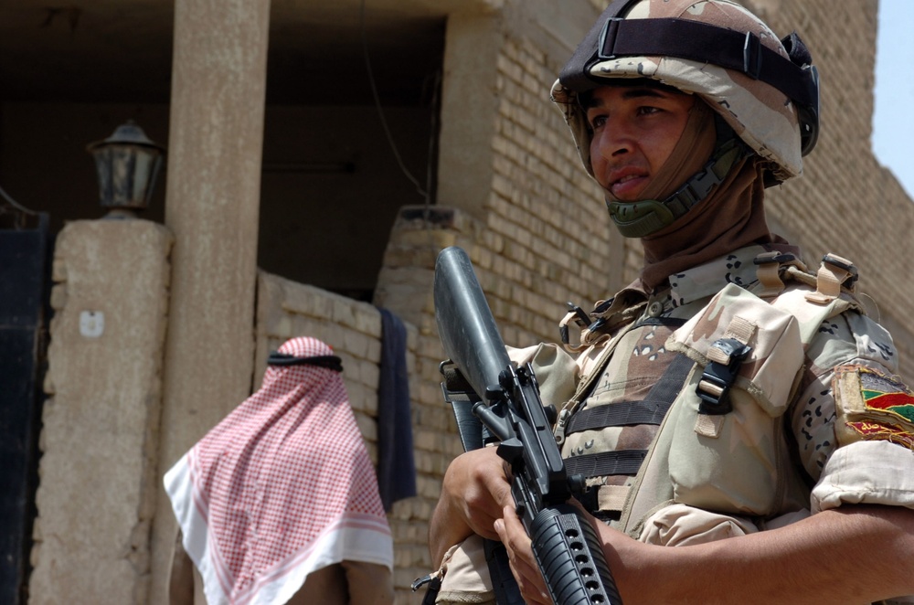 Strike Soldiers, IA patrol Abu Ghraib market, discover needs of local Iraqi citizens