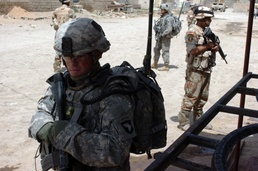 Strike Soldiers, IA patrol Abu Ghraib market, discover needs of local Iraqi citizens