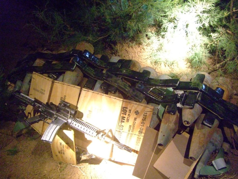 Soldiers aid residents, remove weapons cache