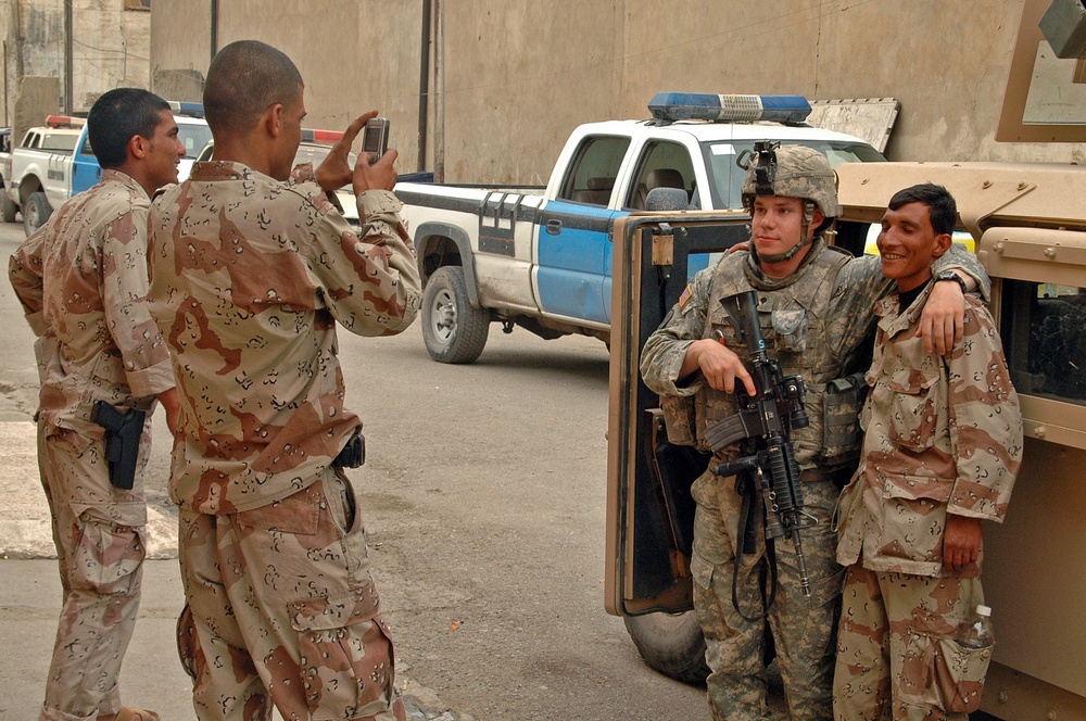 Killer Troop shows softer side to Iraqi children, Mosul