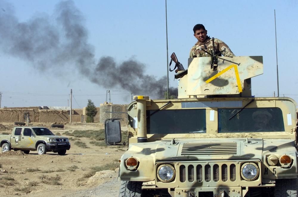 Meeting signals to U.S. Soldiers in Bayji that Iraqis are primed to shift focus