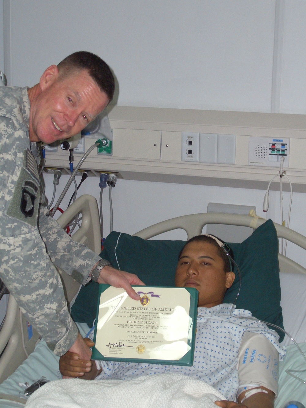 Private Receives Purple Heart, CIB