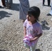 Soldiers hand out clothes, shoes to Iraqi children