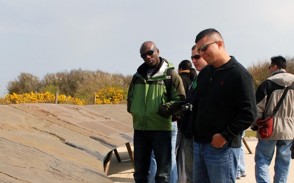 Soldiers study Normandy battlefield