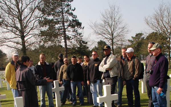Soldiers study Normandy battlefield