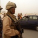 Iraqi police work with Marines at vehicle checkpoint
