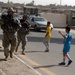 Cobra troops patrol streets of northwest Baghdad