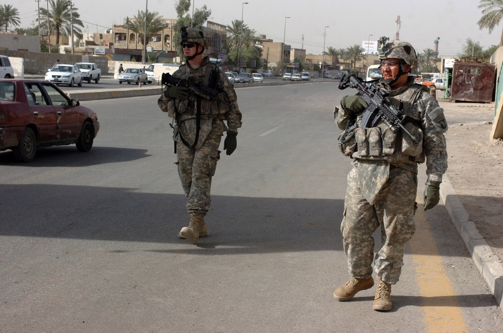 Cobra troops patrol streets of northwest Baghdad