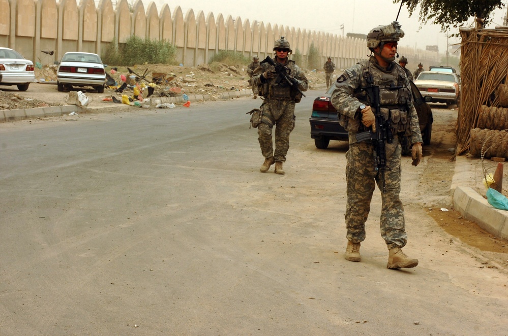 Cobra troops patrol streets of northwest Baghdad