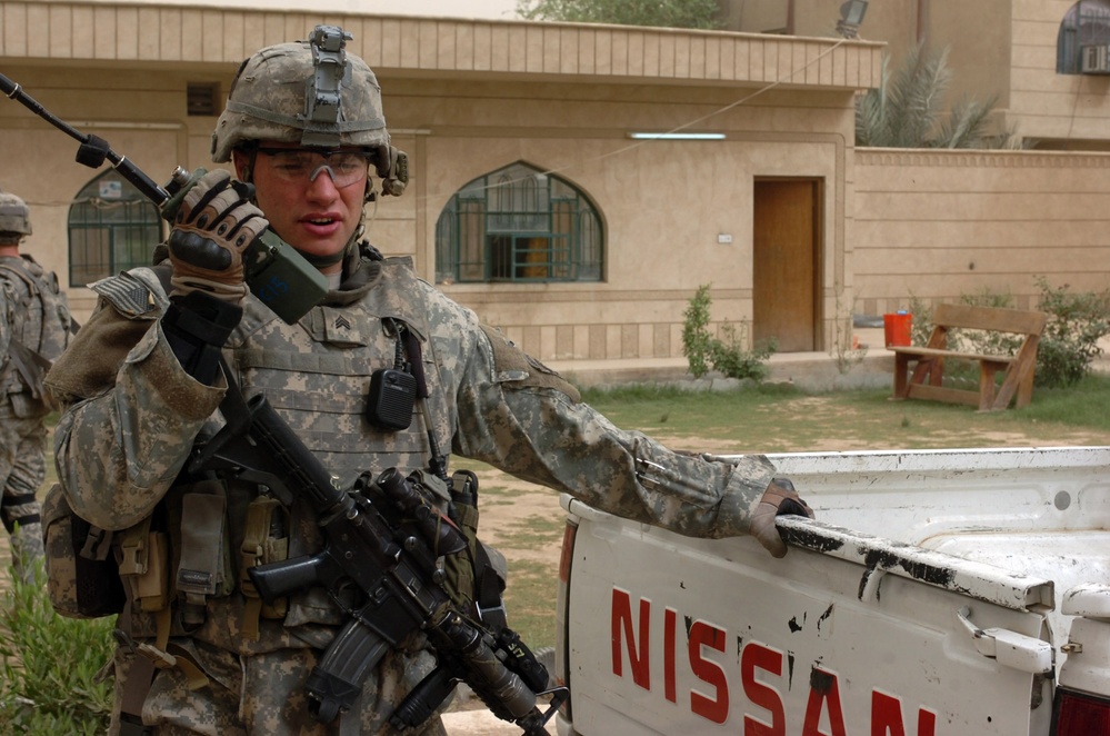 Cobra troops patrol streets of northwest Baghdad