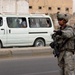 ISF, MND-B Soldiers search vehicles in northwest Baghdad