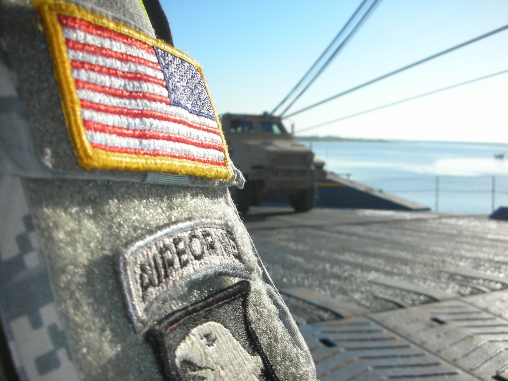 MRAP Drives Onto Cargo Ship Ramp