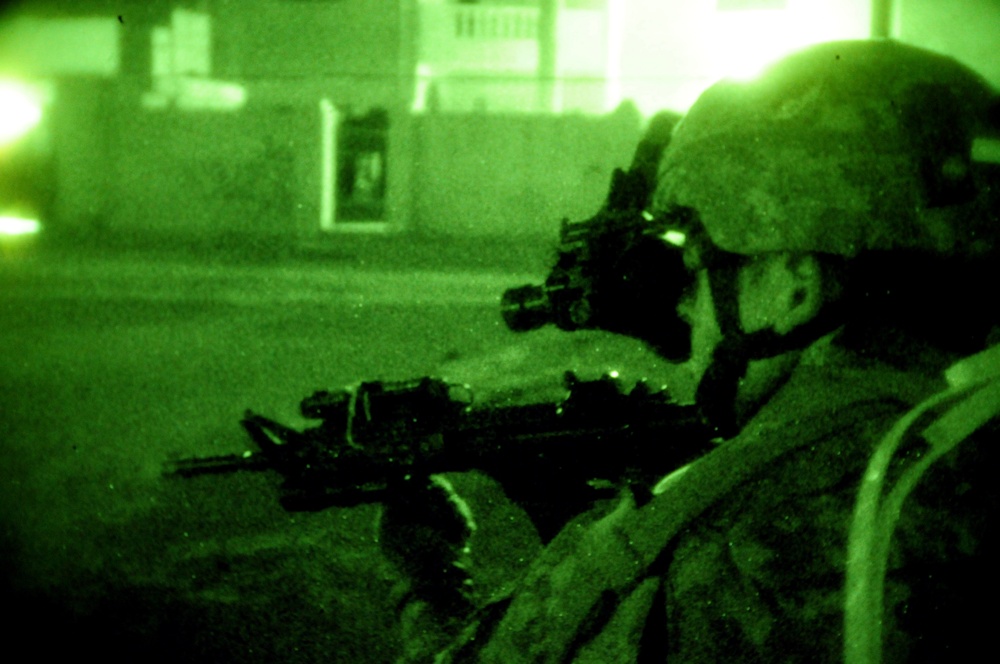 AIrborne Soldiers patrol Tikrit under a blanket of darkness