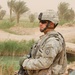 Wolfhounds patrol through Taji in sandstorm