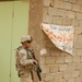 Wolfhounds patrol through Taji in sandstorm