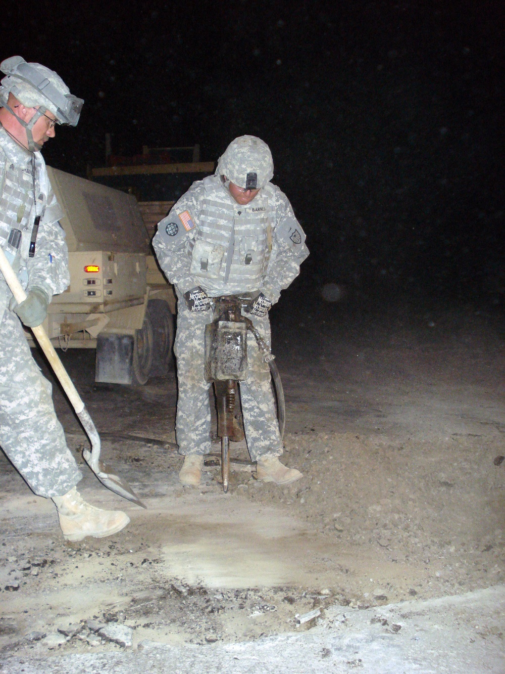Soldiers from Mississippi's 230th Concrete Team patches roads after IED blasts
