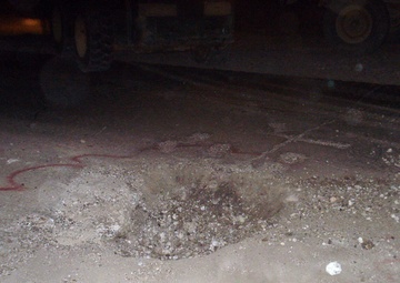 Soldiers from Mississippi's 230th Concrete Team patches roads after IED blasts