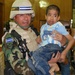 Soldiers Extend Hand to Iraqi Children