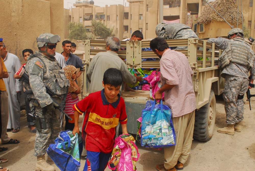 DVIDS - News - Coalition forces provide aid to displaced families