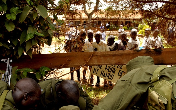 Soldiers train with members of the Old Guard