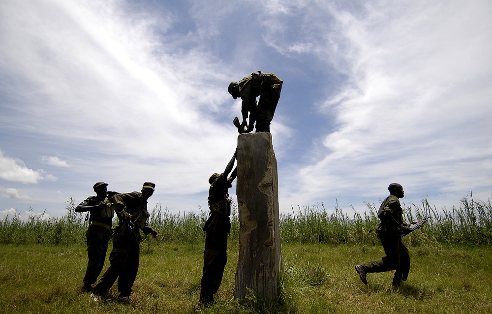Soldiers train with members of the Old Guard