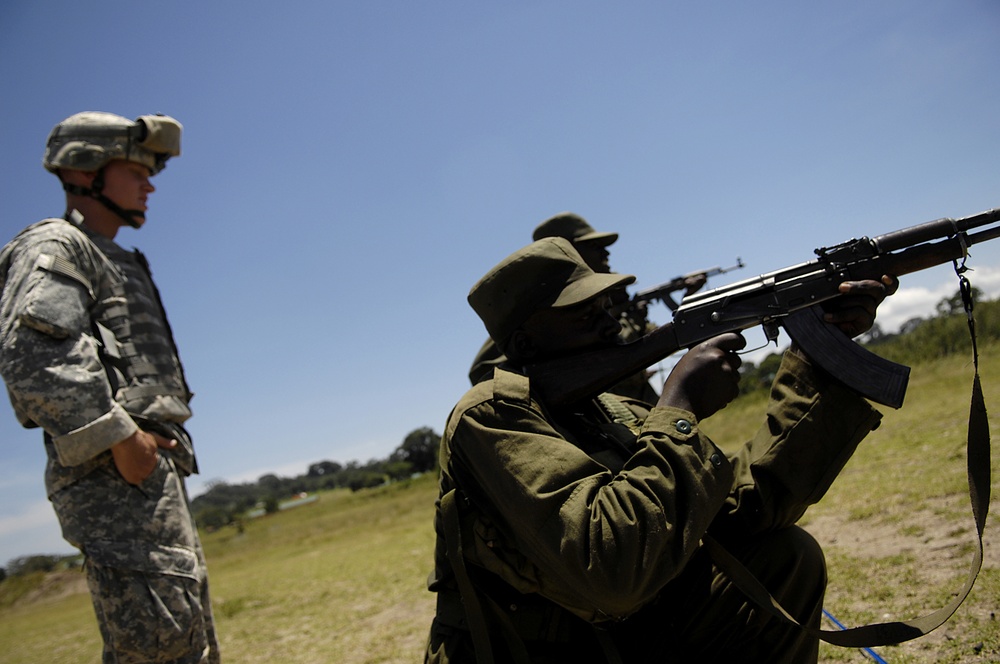 Soldiers train with members of the Old Guard