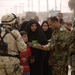 Soldiers grant supplies to Iraqi civilians