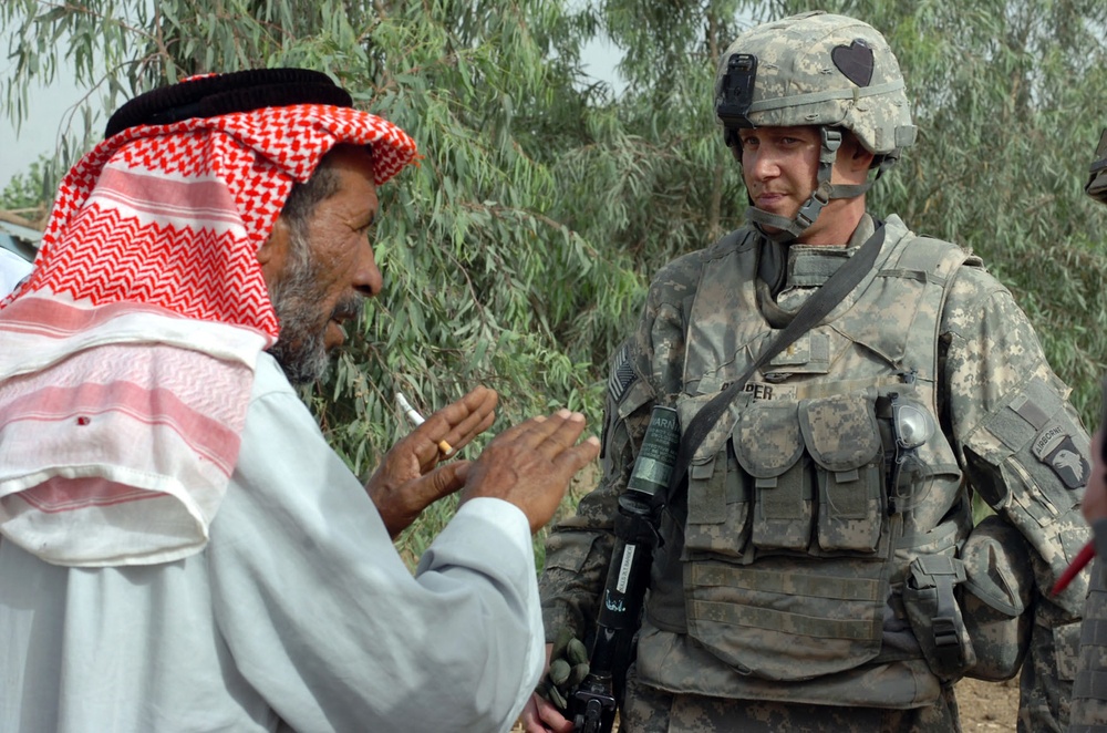Soldiers consult sheiks