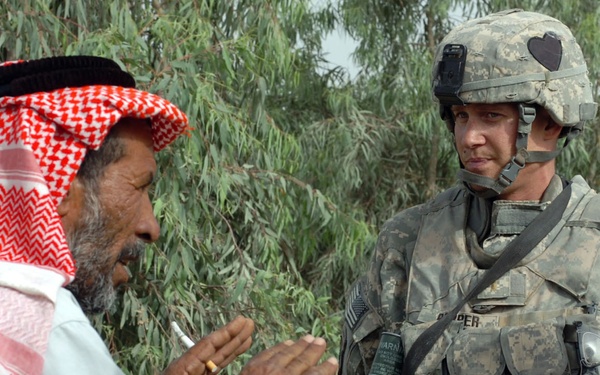 Soldiers consult sheiks