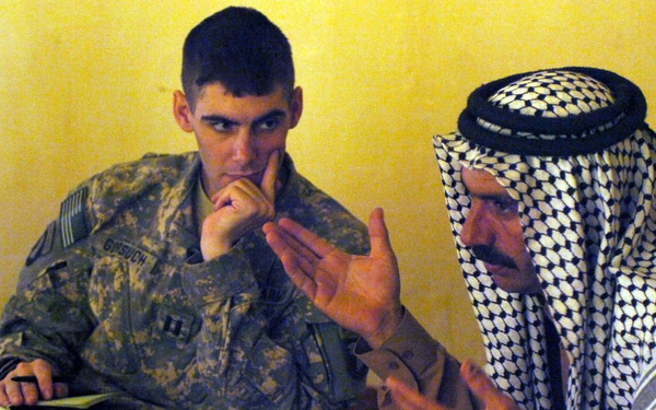 Soldiers consult sheiks